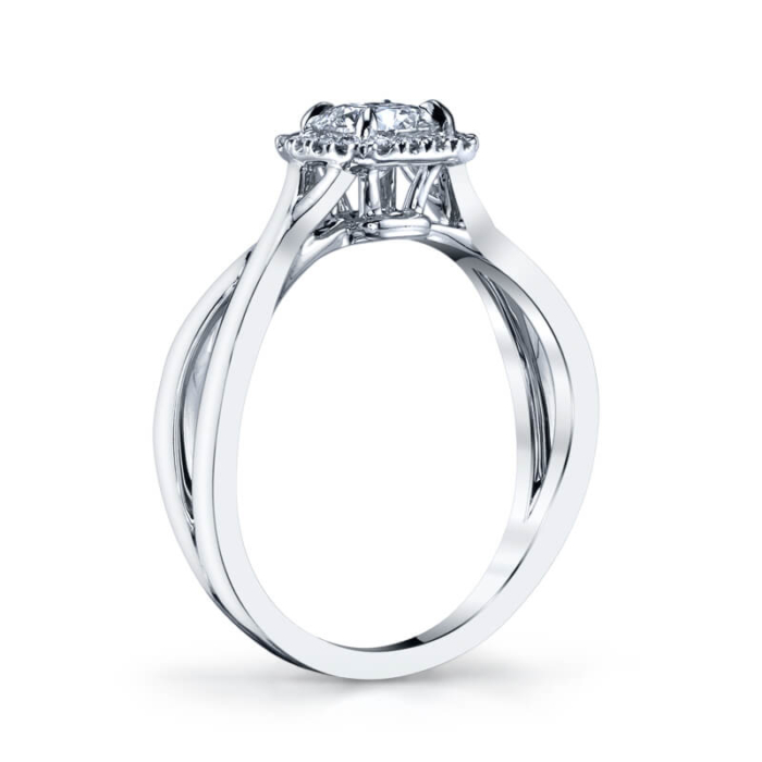 a three stone engagement ring with two diamonds on top