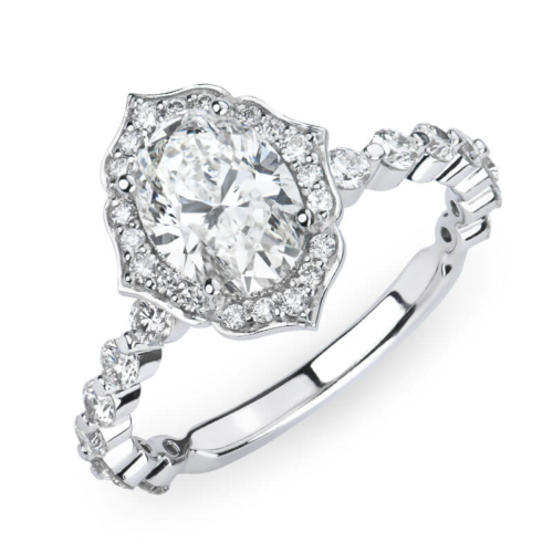 a white gold ring with an oval cut diamond