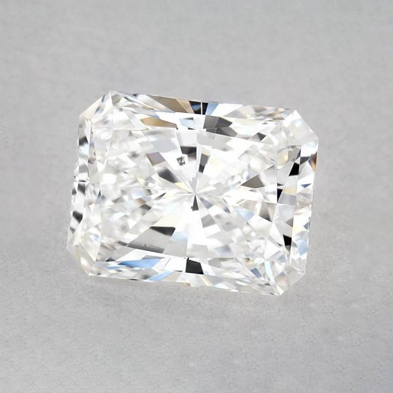 a cushion cut diamond on a white surface