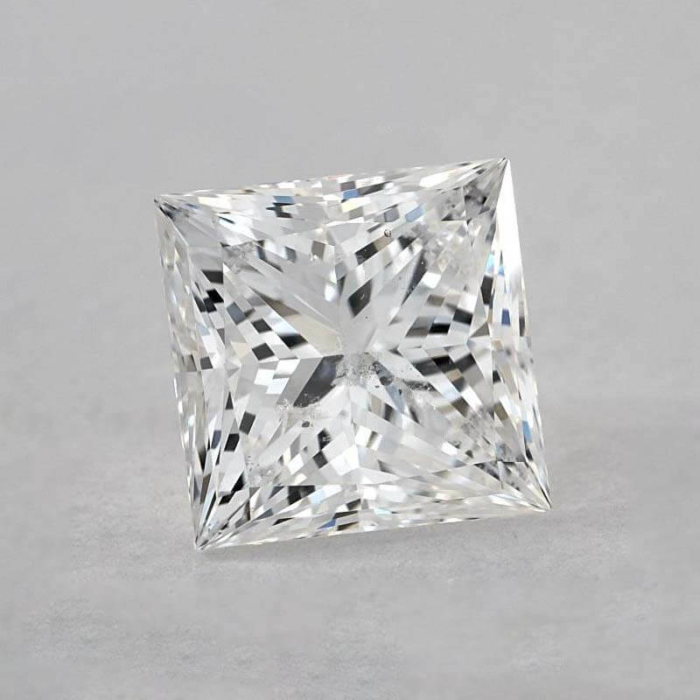 a princess cut diamond on a white background