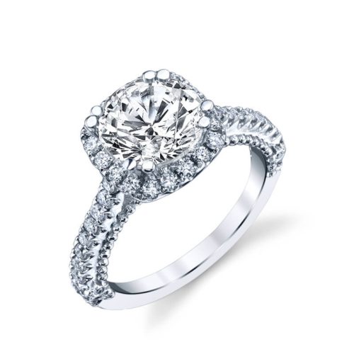 a white gold engagement ring with a diamond center