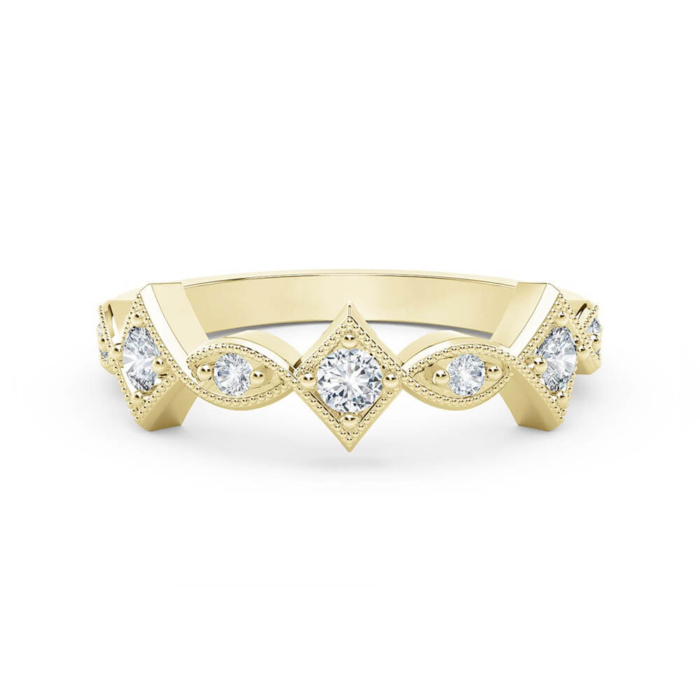 a yellow gold wedding band with diamonds
