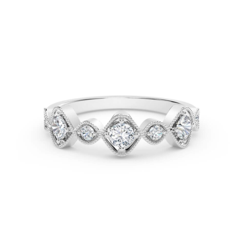 a white gold ring with three diamonds on it