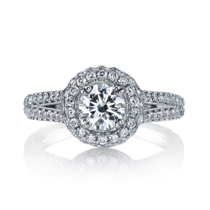 a diamond ring with a halo setting on top