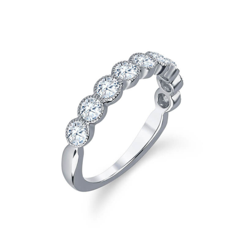a white gold ring with five diamonds