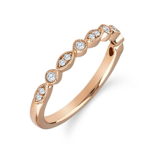 a rose gold wedding band with diamonds