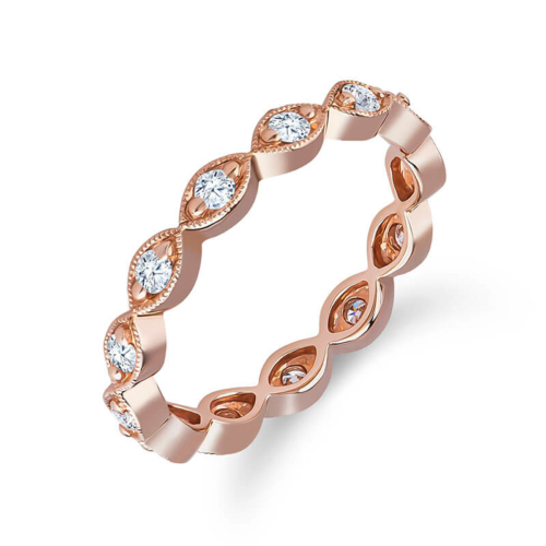 a rose gold ring with diamonds on it