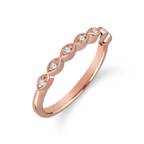a rose gold wedding band with diamonds