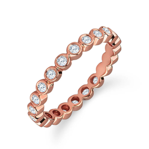 a rose gold ring with diamonds