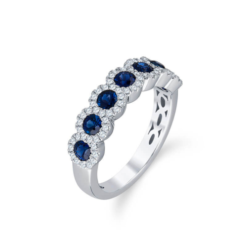 a white gold ring with blue sapphires and diamonds