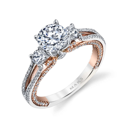 a white and rose gold engagement ring with diamonds
