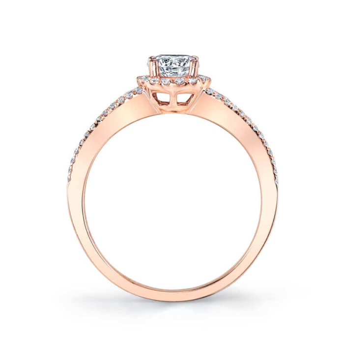 a rose gold engagement ring with a diamond center