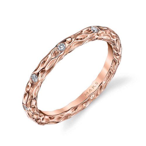 a rose gold wedding ring with diamonds