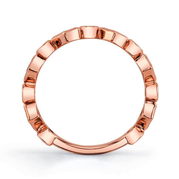 a rose gold ring with small round beads
