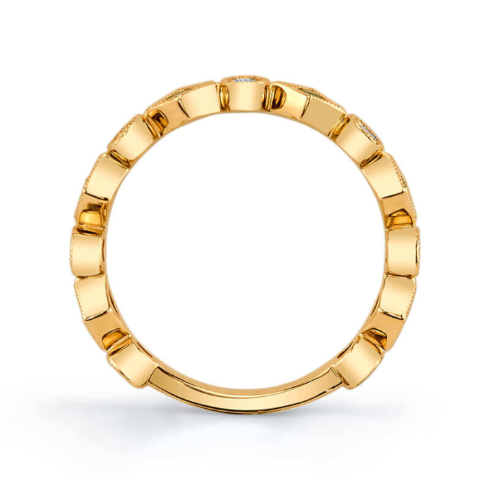 a yellow gold ring with small diamonds