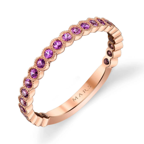 a pink gold ring with purple stones