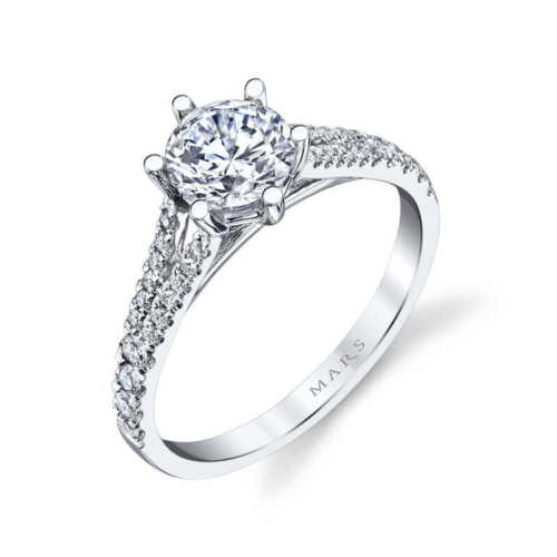 a white gold engagement ring with diamonds on the side
