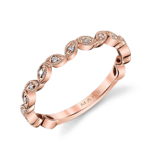 a rose gold wedding band with diamonds