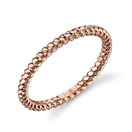 a rose gold ring on a white background