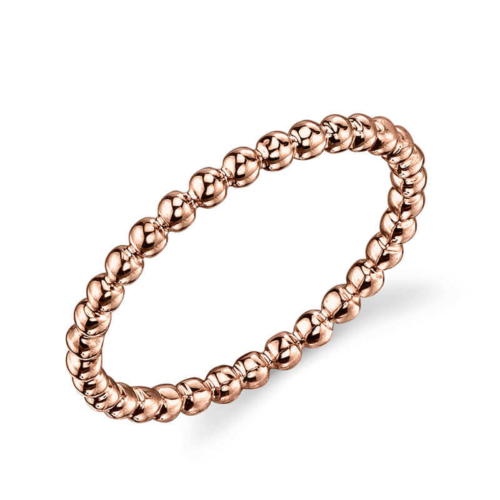 a rose gold braided ring on a white background