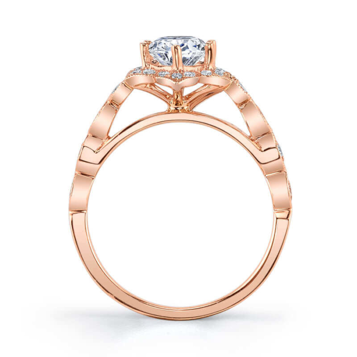 a rose gold engagement ring with an oval center stone
