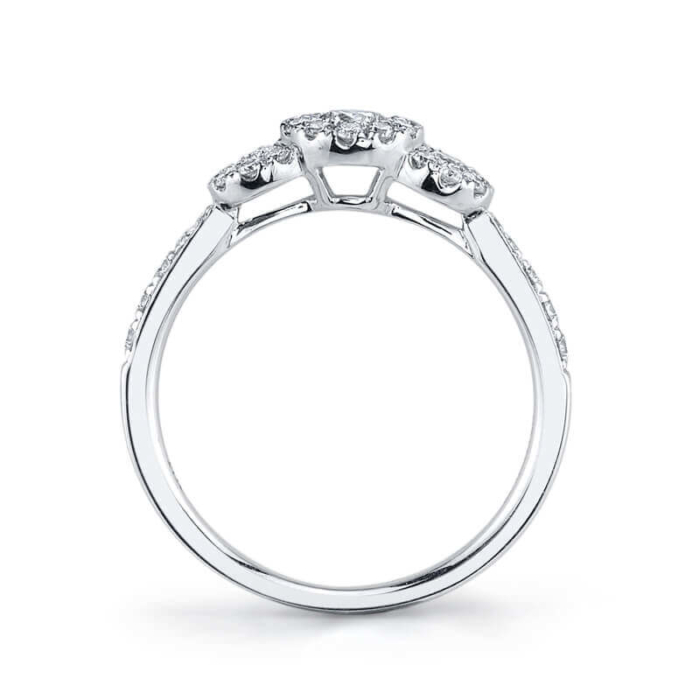 a white gold ring with three diamonds on top