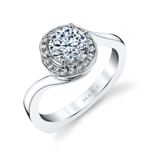 a white gold ring with a round diamond center