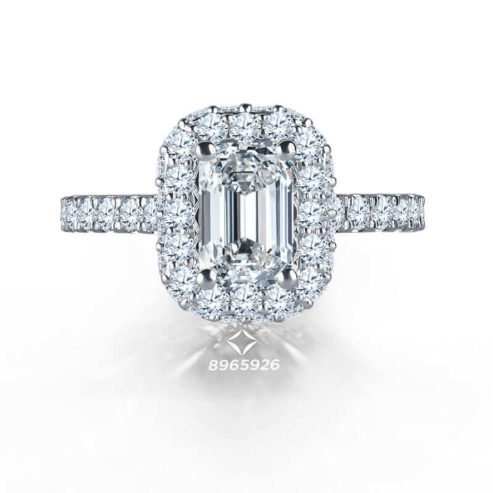 an emerald cut diamond engagement ring with halos