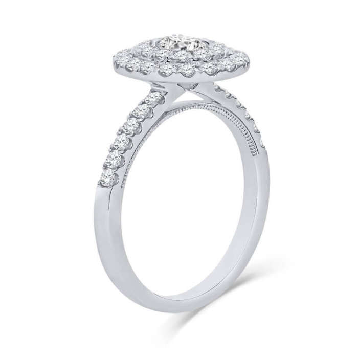 a white gold engagement ring with two round diamonds